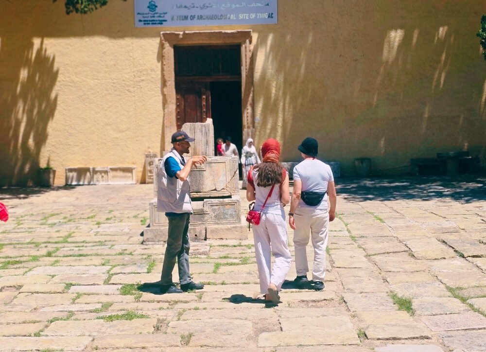 Local guide Toufik leading Timgad tour